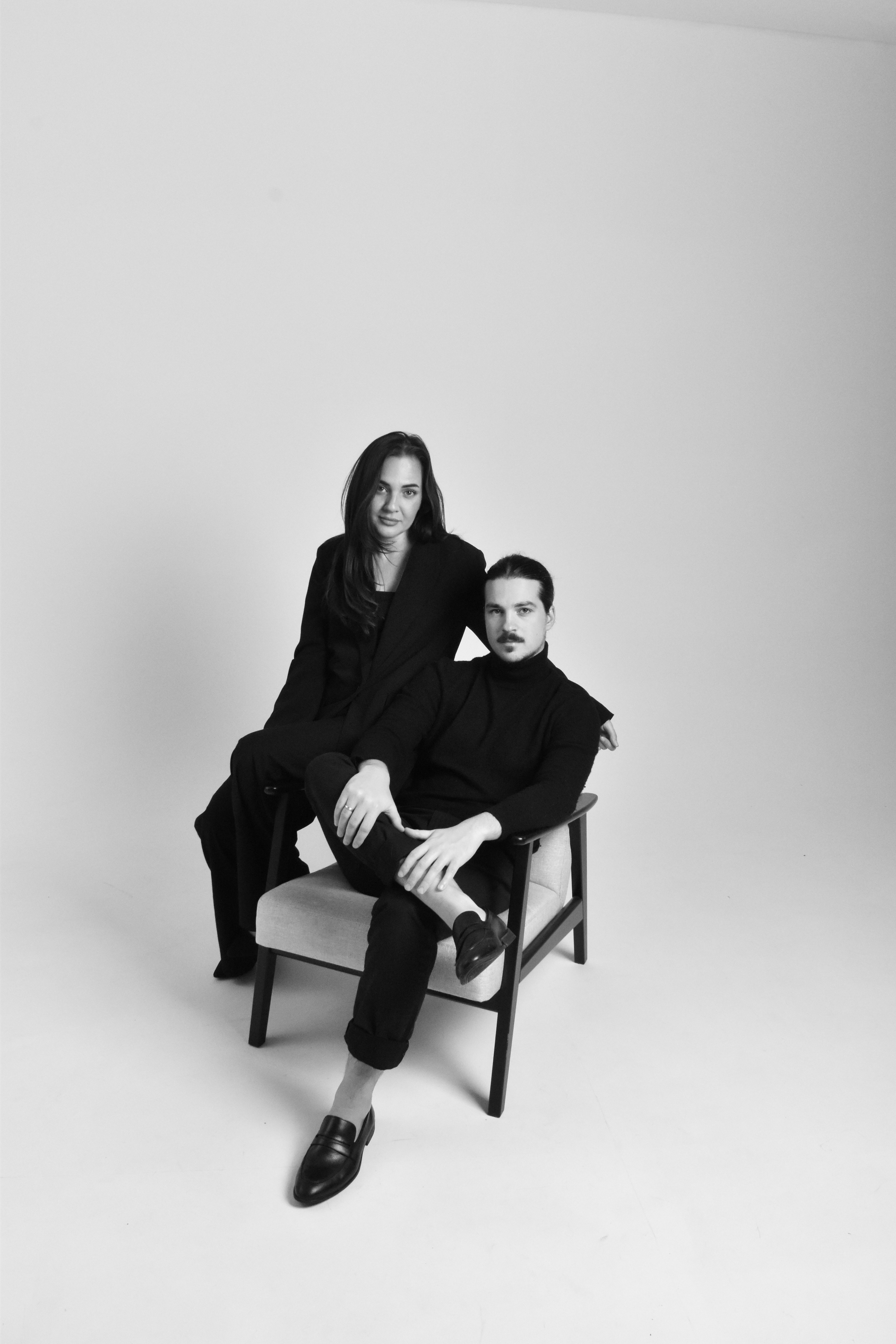 founders sitting on a chair in a studio